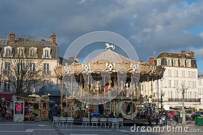 Antique Carousel on the main square of Fontainebleau Editorial Stock Photo