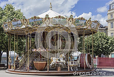 Antique carousel in the middle of Bordeaux City Editorial Stock Photo