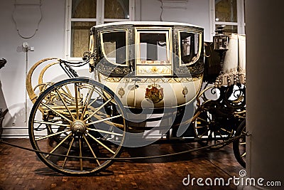 Antique carriage on exhibitin the Marstallmuseum Editorial Stock Photo