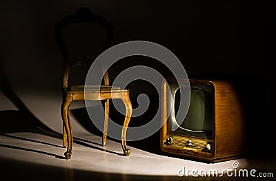 Antique chair and television Stock Photo