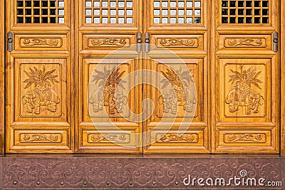 The antique Chinese wooden carved doors Stock Photo