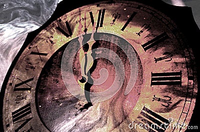 Antique clock striking midnight Stock Photo