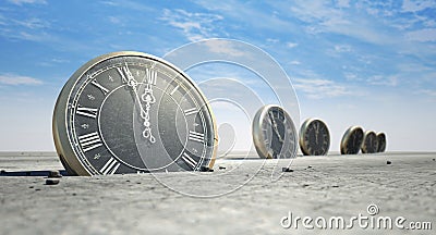 Antique Clocks In Desert Sand Stock Photo