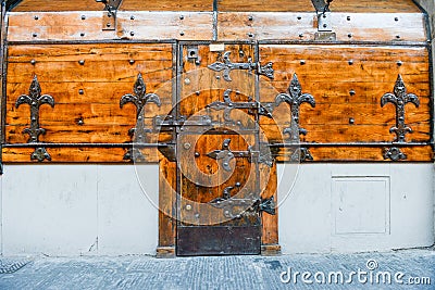 Antique closed door and windows of a shop at Firenze Stock Photo