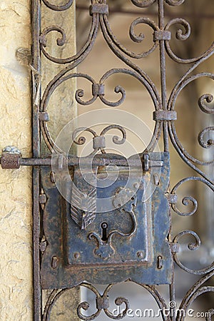 Antique closed iron gate Stock Photo