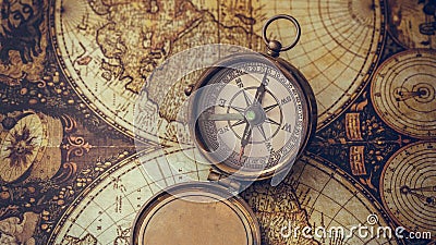 Antique Compass On Old World Map Stock Photo