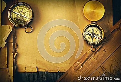 Antique compass over old map Stock Photo