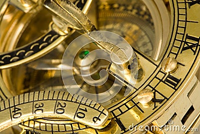 Antique compass with sundial. Stock Photo