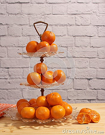 Antique Crystal Dish With Small Oranges. Dessert Display Stock Photo