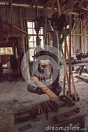 Antique 20 Drill Press inside the 1904 Large Machine Shop at historic Koreshan State Park Editorial Stock Photo