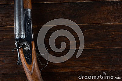 Antique 12-gauge break-action smooth-bored shotgun with paper cases Stock Photo