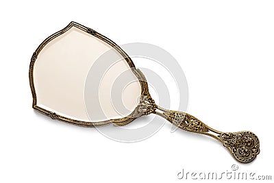 Antique Gilded Hand Mirror over White Stock Photo