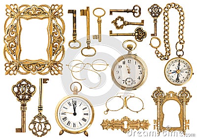 Antique golden accessories. Vintage picture frame clock key Stock Photo