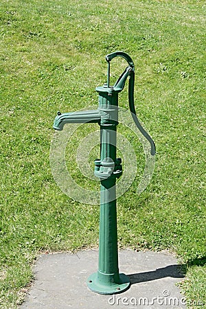 Antique green pump Stock Photo