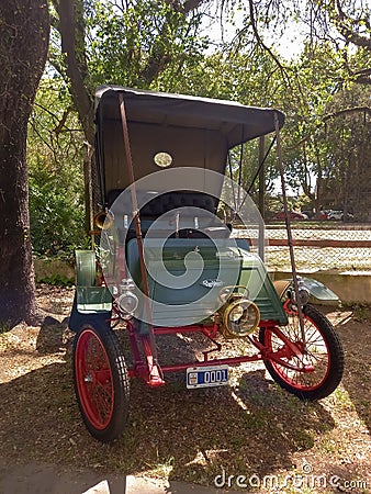 Antique green 1902 Rambler Model D Runabout roadster in a park. Autoclasica 2022 classic car show Editorial Stock Photo