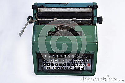 antique green typewriter, analogical typing. Stock Photo