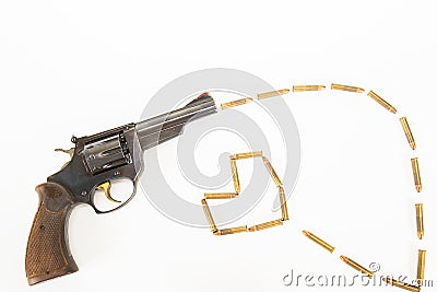 Antique gun and bullets isolated on white background Stock Photo