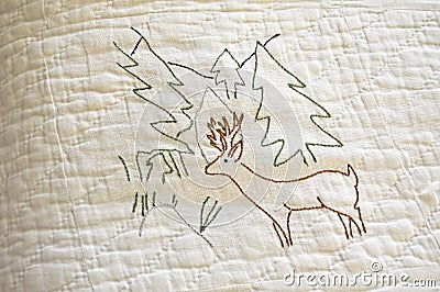 Antique hand embroidery deer Stock Photo