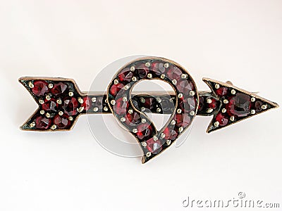 Antique heart and arrow brooch Stock Photo