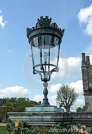 Antique lamp on pedestal Stock Photo