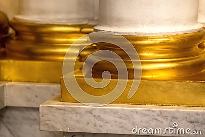 Antique marble base with golden odorment Stock Photo