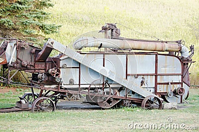 Antique combine harvester north dakota Stock Photo