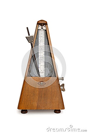 Antique musical metronome isolated Stock Photo