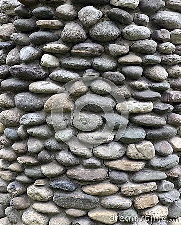 Antique natural stonewall or colored stone background and pattern Stock Photo