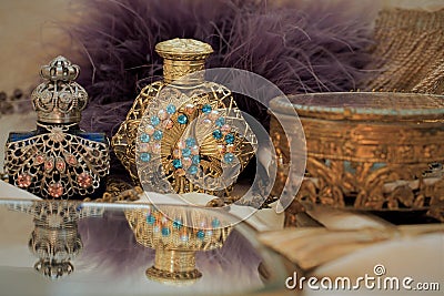 The Antique Perfume Bottles With The Mirror and Boxes Stock Photo