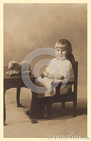 Antique photograph of a baby girl. Stock Photo