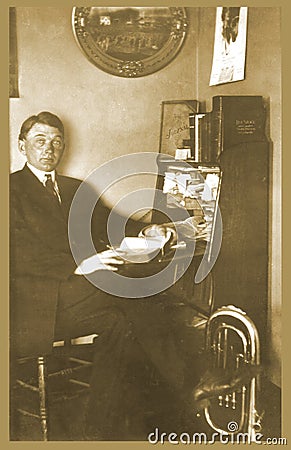 Antique photograph of man at desk Stock Photo