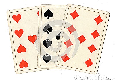 Antique playing cards showing three nines. Stock Photo