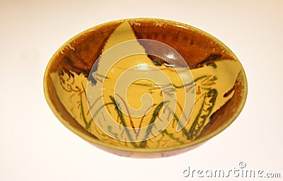 Antique porcelain bowl with mountains figure in showed in the museum Editorial Stock Photo