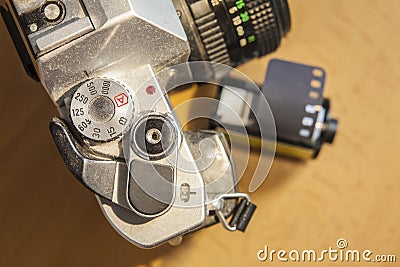 Antique reflex camera with film roll Stock Photo