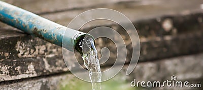 Antique rubber tube flow water Stock Photo