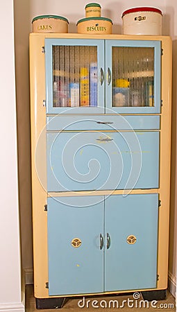 Antique 1950's kitchen larder cabinet in pale blue and cream Stock Photo