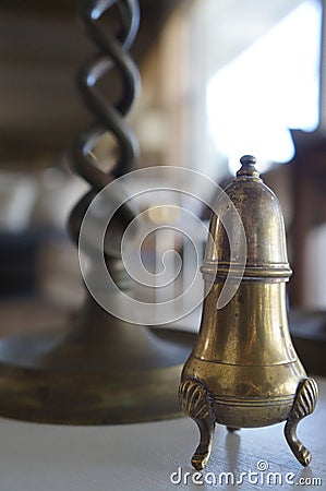 Antique salt shaker with candlestick Stock Photo