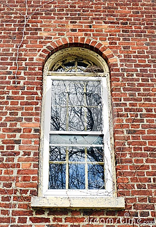 Antique Shaker window in historic brick Watervliet building Stock Photo