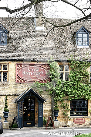 An antique shop in Stow on the Wold in Gloucestershire in the UK Editorial Stock Photo
