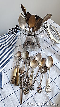 Antique spoons. Cutlery. Collection of teaspoons. Old crockery. Stock Photo