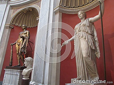 Antique statues of marble and bronze at the Vatican Museum, Rome, Italy. Editorial Stock Photo