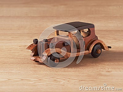 An antique toy car made of wood Stock Photo