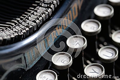 Antique typewriter from beginning 20th century at industry exhibit in an art gallery Editorial Stock Photo