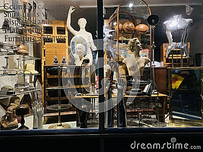 Antique vintage objects shop window in London England Editorial Stock Photo