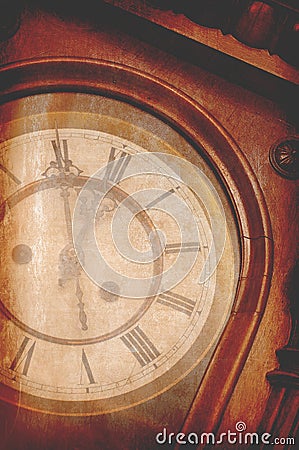 Antique vintage wall clock showing five minutes to midnight Stock Photo