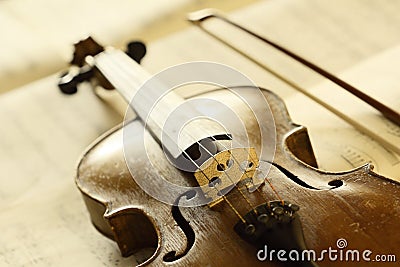 Antique violin with fiddlestick Stock Photo