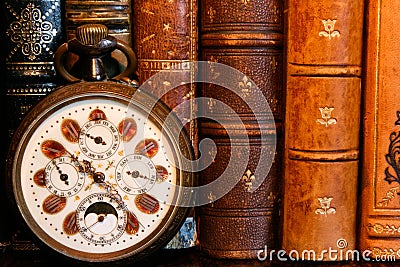 Antique watch with antique books Stock Photo