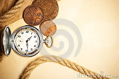 Antique watch and money Stock Photo