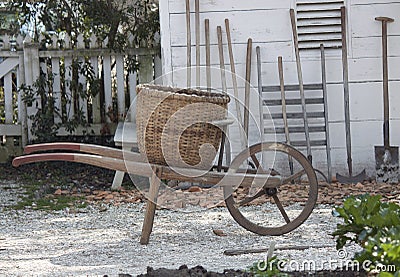 Antique wheelbarrow Stock Photo