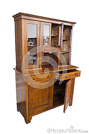 Antique wooden italian furniture just restored with opened dresser and showcase on white background Stock Photo